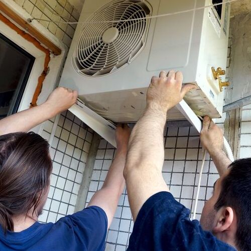 Technicians Install Mini Split System