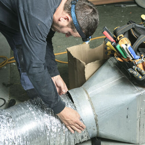 HVAC Technician Provides Air Duct Repair.