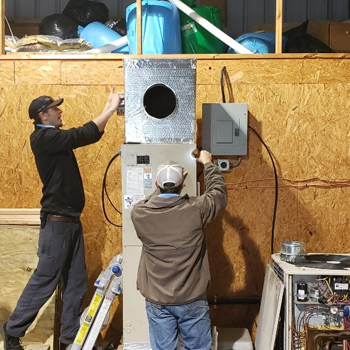 A Heating Company Installs a Furnace.