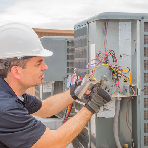 A Technician Provides HVAC Repair.